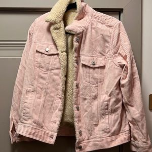 Pink Sherpa jacket.